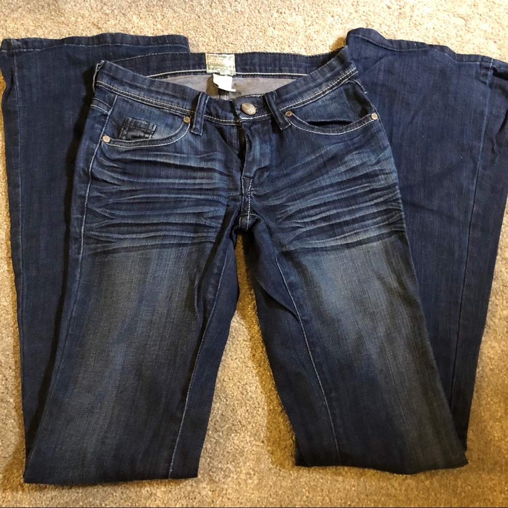 Arden B. Distressed Wide legged Jeans